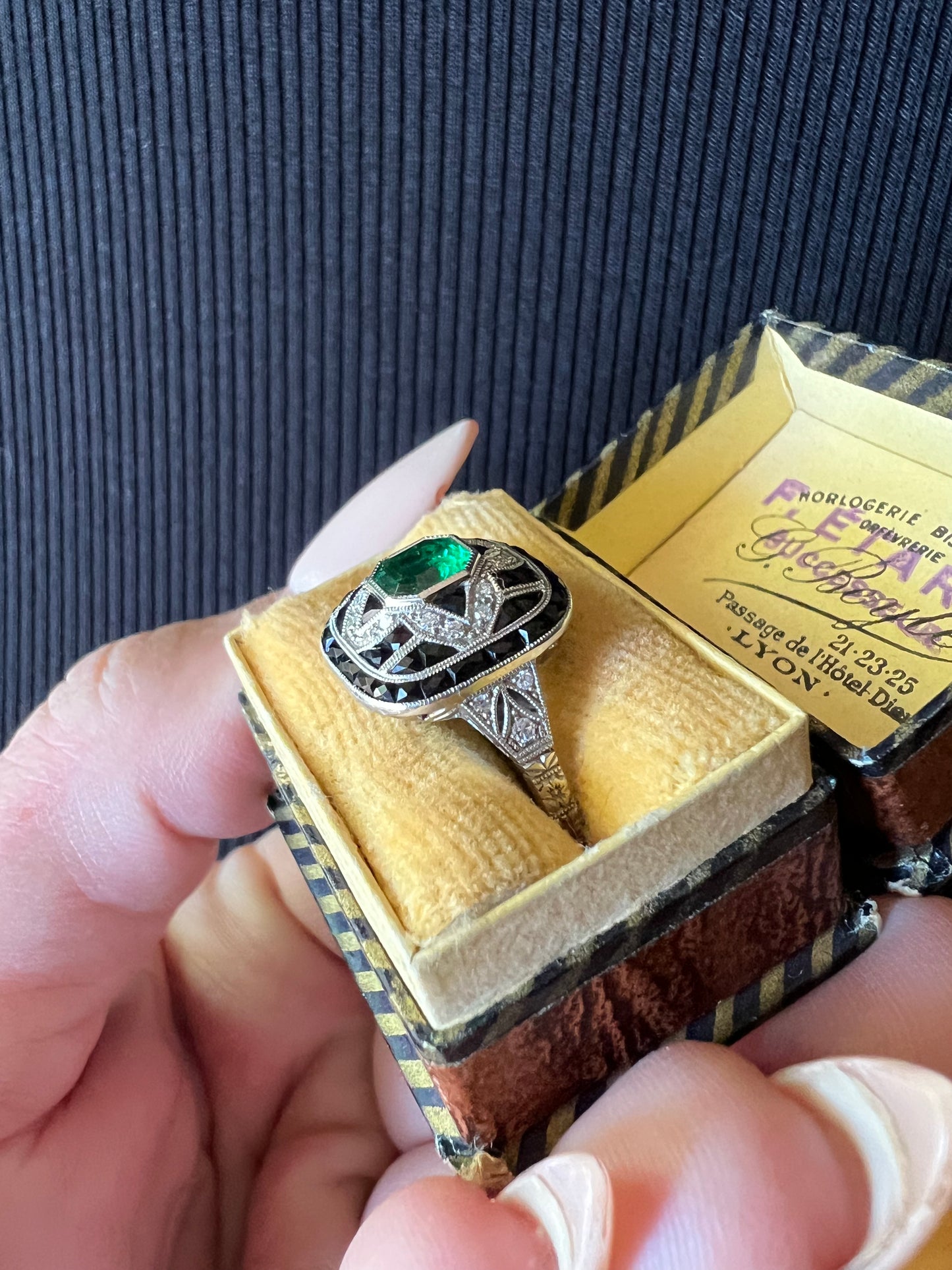 Art deco style emerald and onyx ring